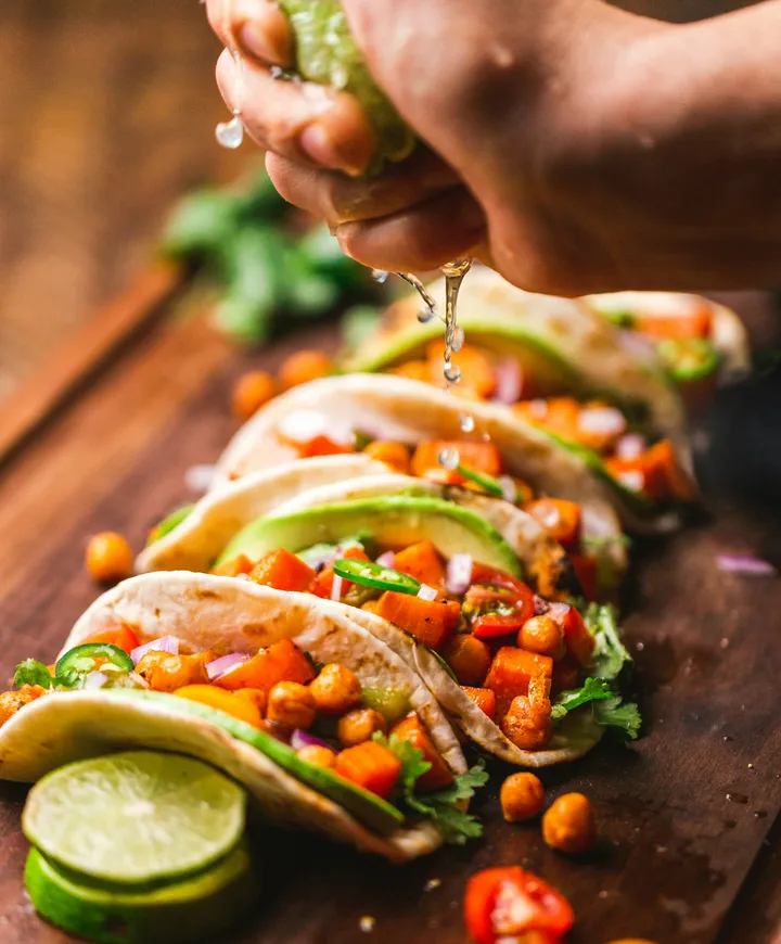 Vegetable tacos with avocado and a squeeze of lime
